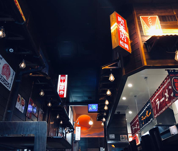Interior of ramen restaurant with Japanese traditional signs
