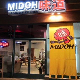 Exterior of Midoh with a sign